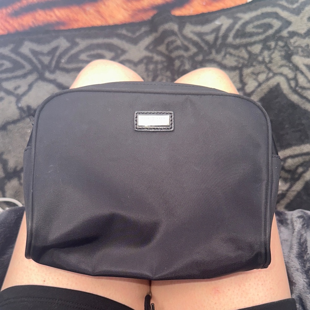 Gold Pfeil black toiletry bag silver hardware